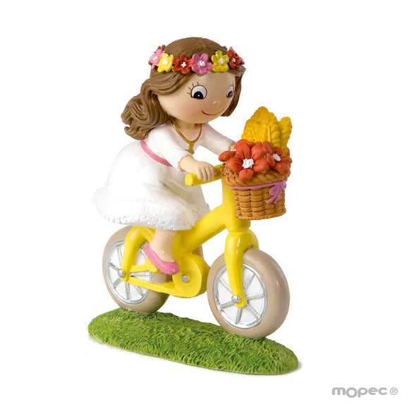 Y912.2 Figura pastel niña Comunión en bici 13,5cm.