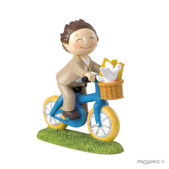 Y912.3 Figura pastel niño Comunión en bici 13,5cm.